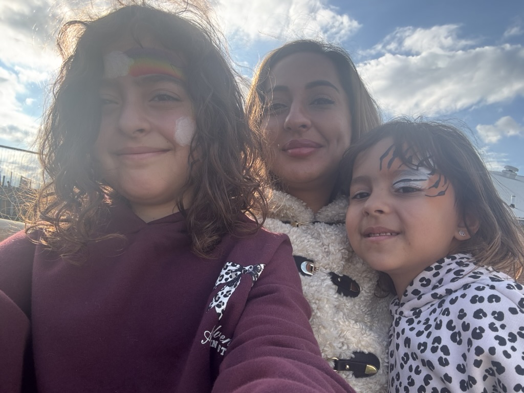 Nita McEvoy with her daughters Giorgia and Riya enjoying a sunny family day at the Miracle for Maddi charity football match in Essex.