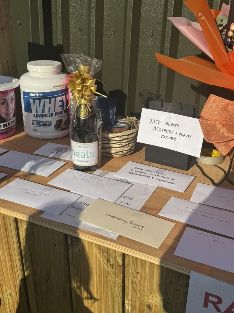 A display of raffle prizes, including a £100 Nita McEvoy aesthetic and beauty voucher, at the Miracle for Maddi charity football fundraiser.
